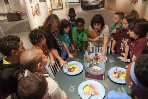 Fourth-grade students from C.W. Norton Elementary School visit the "First Colony: Our Spanish Origins" exhibit as part of a two-hour free program. Florida Museum of Natural History photo by Kristen Grace