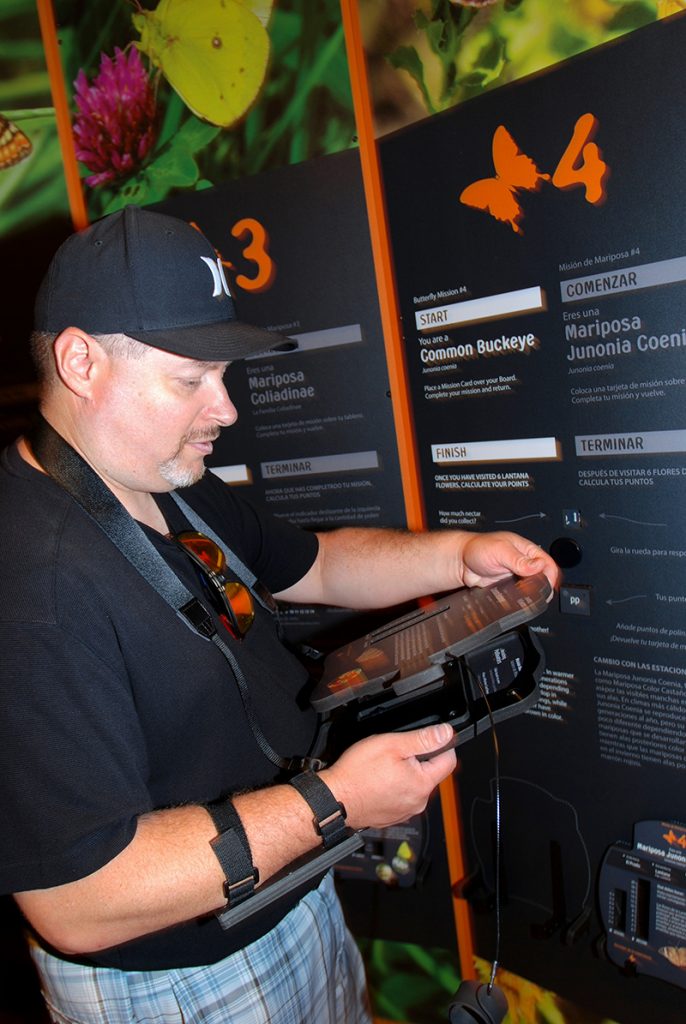 person interacting with exhibit