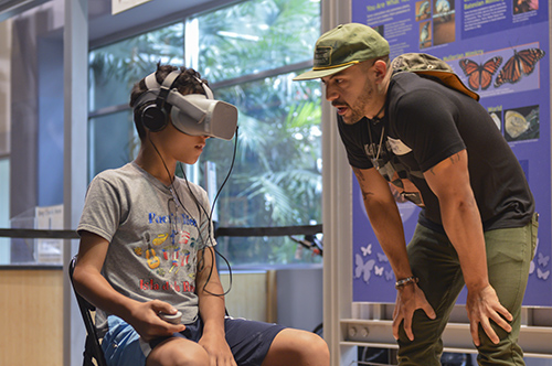 Visitor plays with VR headset