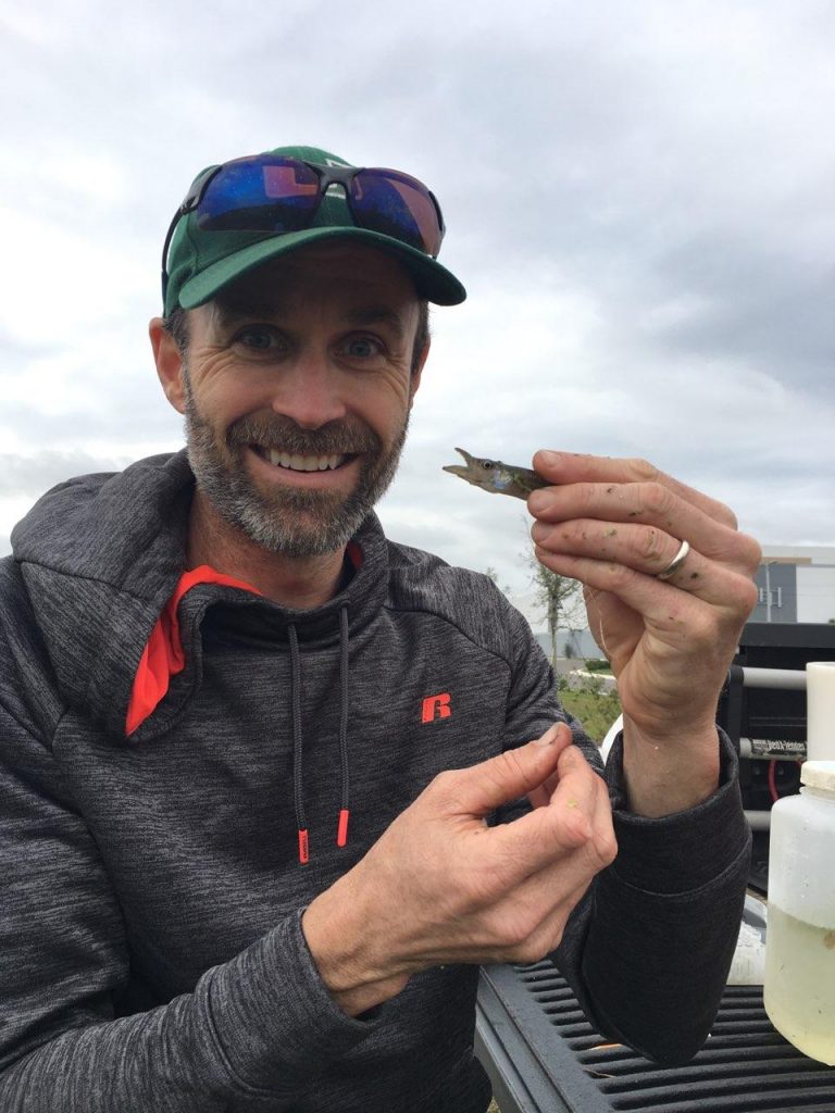 man holding fish