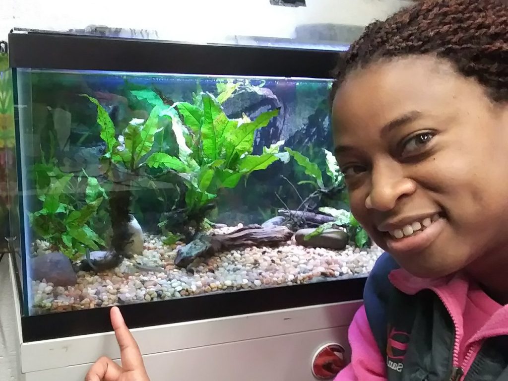 adania selfie with fish tank