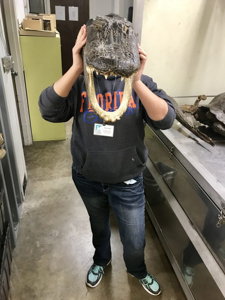 Amber selfie holding gator specimen