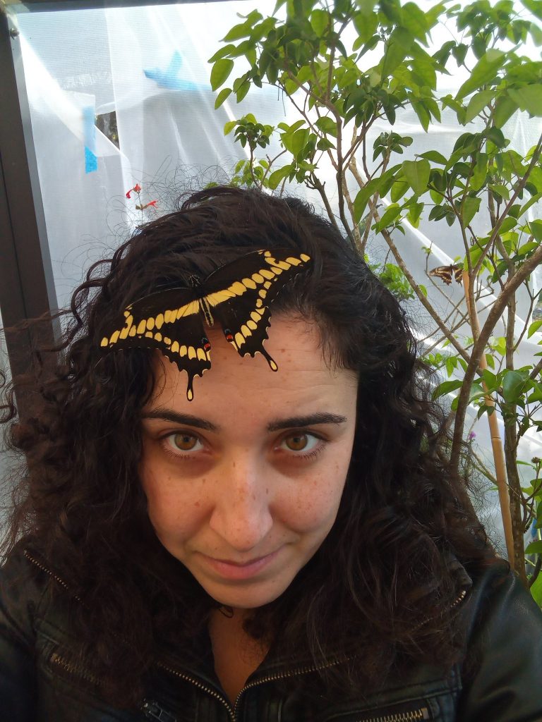 Sarah Cabrera with butterfly in her hair