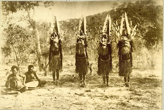 old photo of man with sawfish