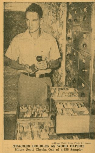 Milton Scott with his collection of wood