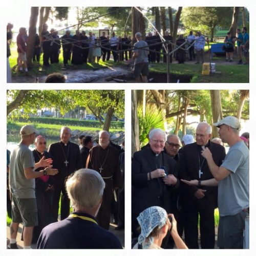 priests getting a tour of the site