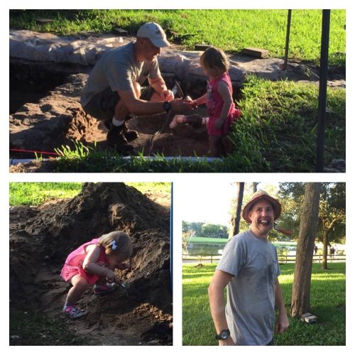 father and daughter at dig site