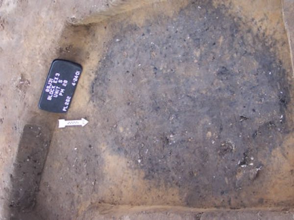 One of the large burned postmolds of the Menendez era