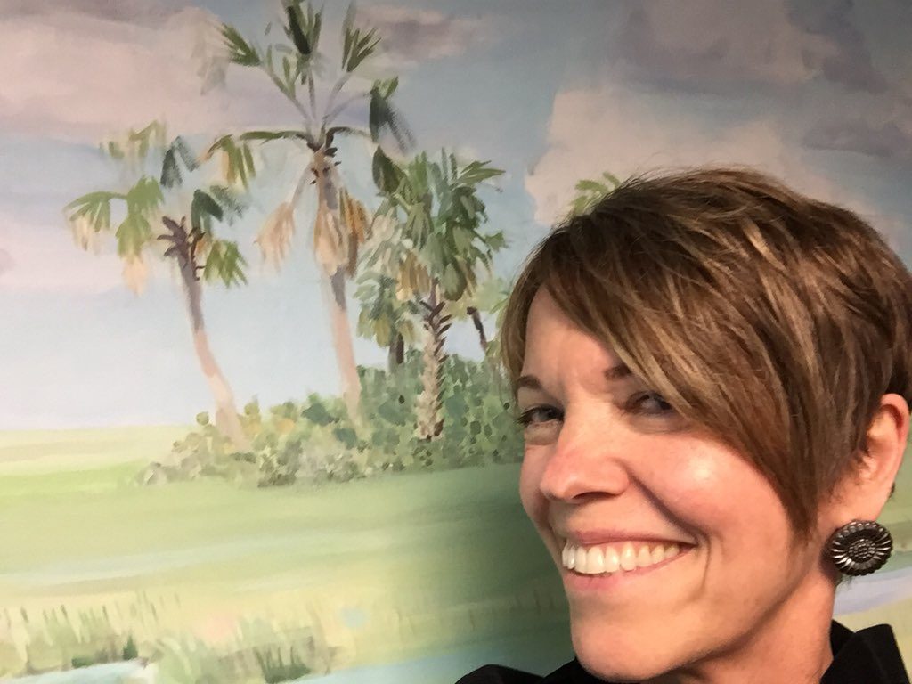 Darcie selfie in exhibit hall