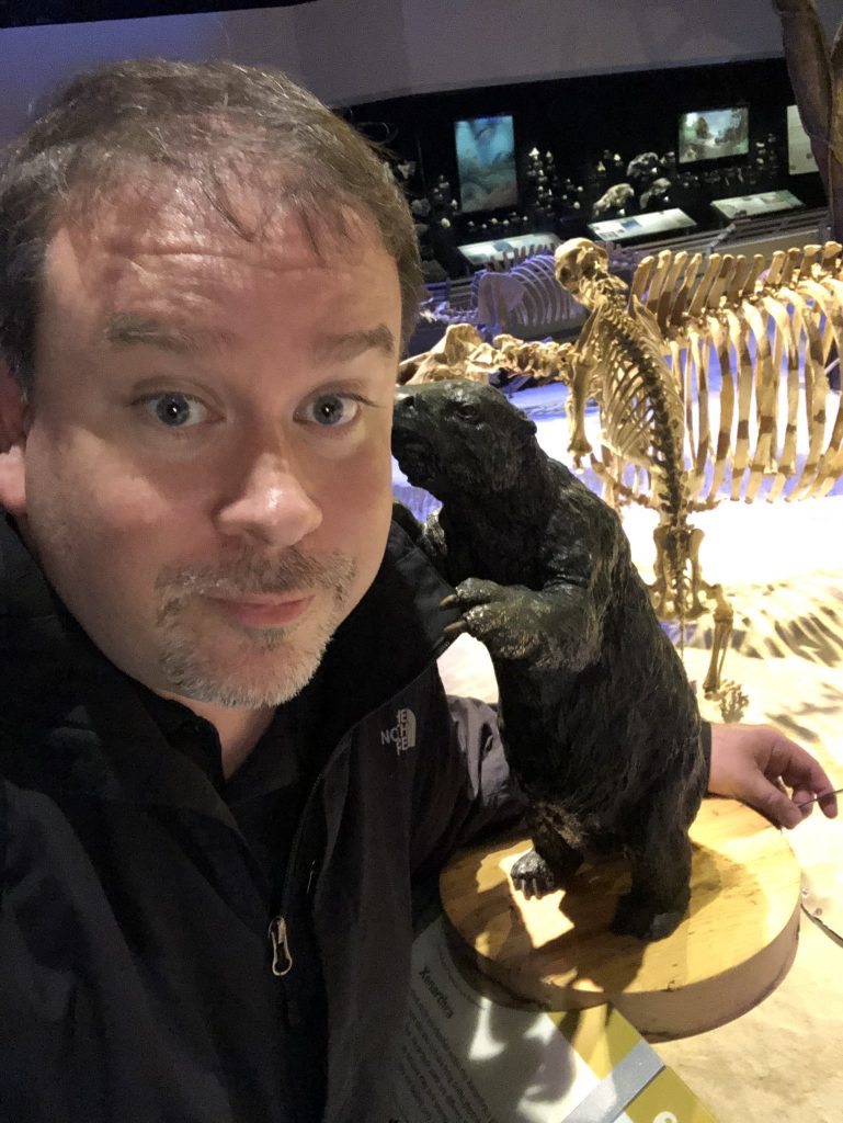 Warren selfie in fossil exhibit