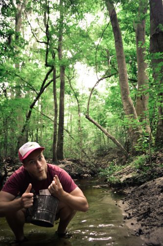 Wesley finds a small shark tooth in a stream bed near Gainesville, FL