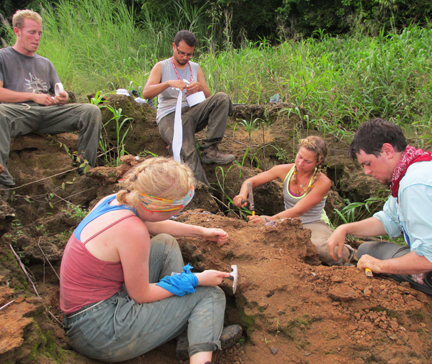 PCP-PIRE postdoc Nathan Jud (lower right) and the Fall 2014 field interns (clockwise from upper left: Adam Freierman, Daniel Mercado, Lillian Pearson, and Hannah O'Neill) excavate a fossil turtle near Lago Alajuela.