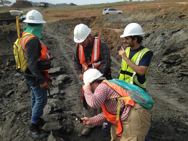 Checking out a well-preserved leaf fossil at the Empire locality.