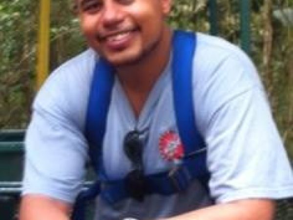 PCP-PIRE intern Justy Alicea ready to be lifted to the jungle canopy.