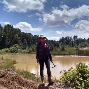 Museum intern Ariel Guggino at the Dawson Clay Pit. Photo courtesy of Ariel Guggino.