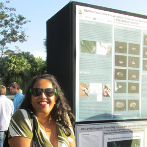 My poster and I at the Symposium. Photo courtesy of Marta Moreno.