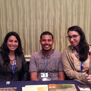 The museum interns seated at a vendor table at the SPNHC meeting. From left to right: Ariel Guggino, Justy Alicea, Andrea De Renzis. Photo courtesy of Dawn Mitchell.