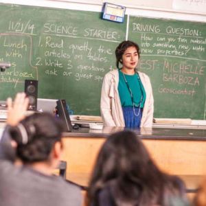 Michelle Barboza speaking to students at a high school in Santa Cruz, CA. Photo by Rob Hoffman