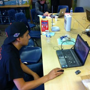 A high school student in Santa Cruz, CA processes images from a 3D scanner.