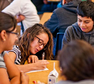 Catalina Pimiento with Middle School students at Cesar Chavez school, Watsonville CA. © Photo by Robert Hoffman - PVUSD Science TOSA, NGSS Curriculum Coach. Santa Cruz, CA.