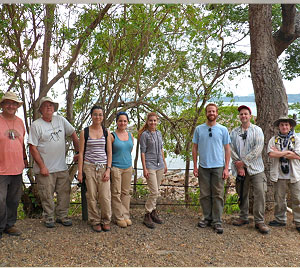 UF Spring Break in Panama participants at Punte Culebra, from left: Jon Bloch, Gary Morgan, Arianna Harrington, Natasha Vitek, Natali Valdes, local sloth, Aaron Wood, Jason Head, Evan Whiting. © Photo by C. Robins