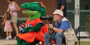 Gary Liljegren and UF mascot 'Alberta' on Presley Field at the University of Florida © Photo by Bruce Hawkins