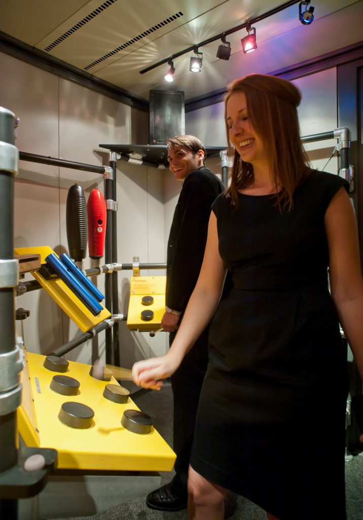 Visitors explore interactive music exhibit