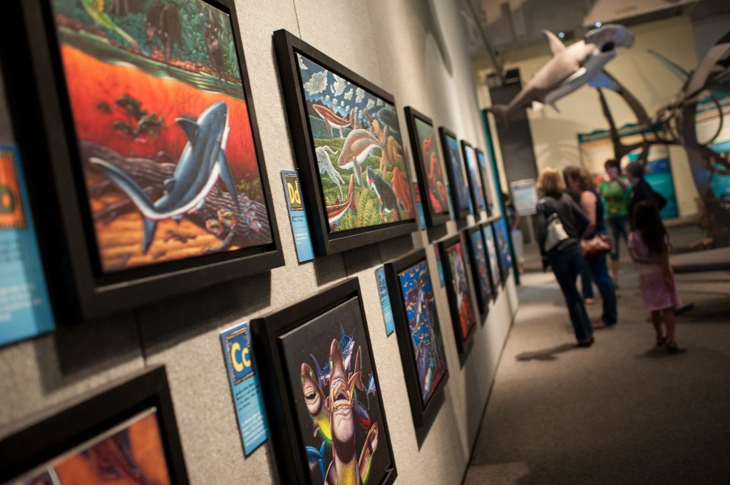 two rows of colorful painting of sea life