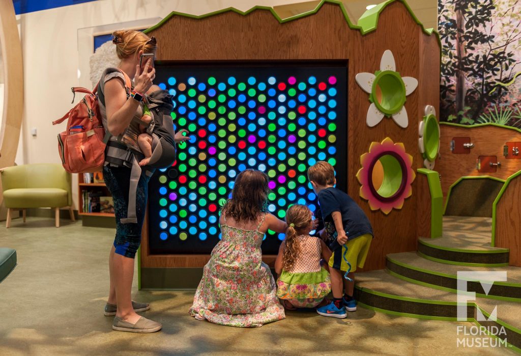 family exploring exhibit