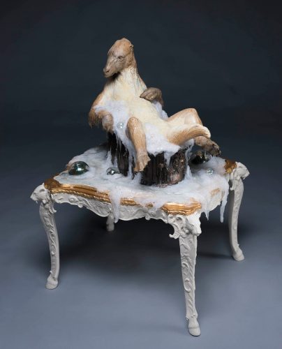 sculpture of a Baignore sitting in a hip bath surrounded by soap bubbles