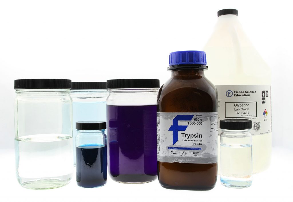 several jars containing differed colored liquids