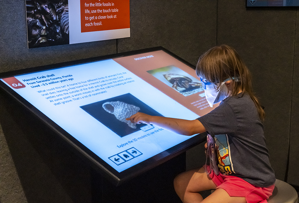 child using touch table