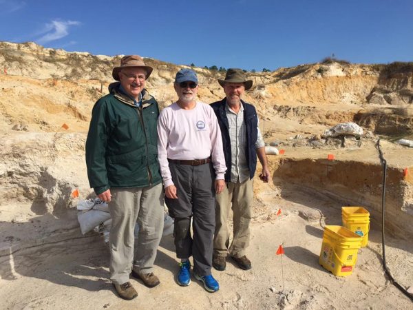 paleontologists at the dig