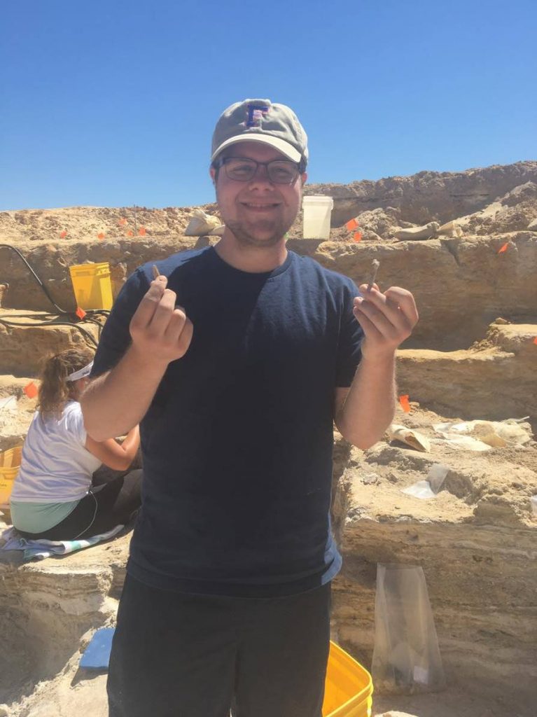 Justin Farley with fossil finds