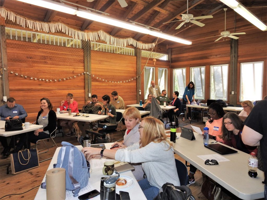 Workshop participants discuss in the Randell Research Center's beautiful classroom.