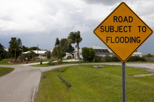 road subject to flooding sign