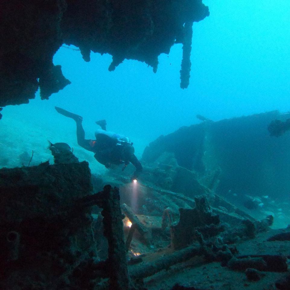 diver on old shipwreck