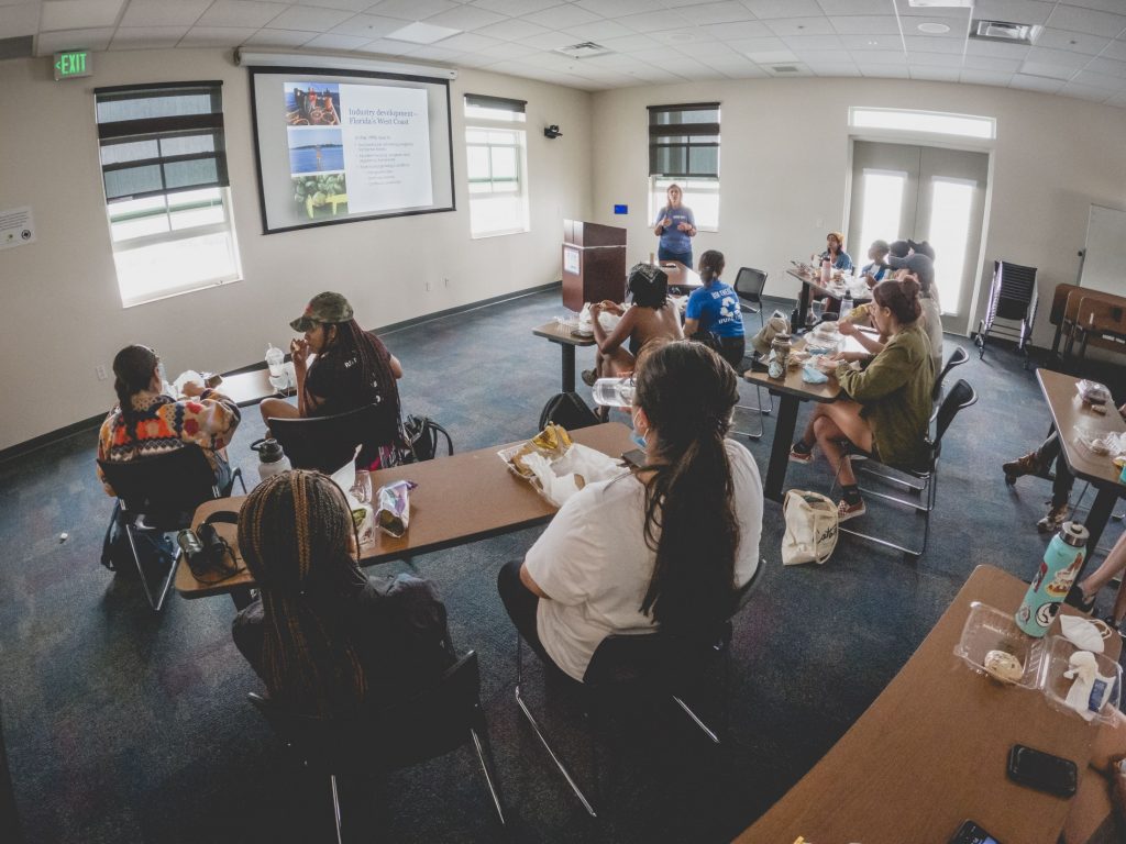 leslie gives lecture about aquaculture in cedar key