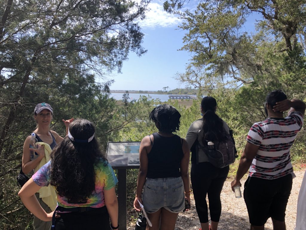 students viewing overlook at shell mound
