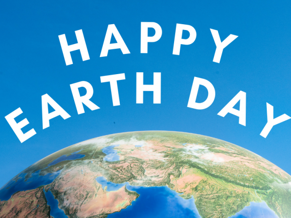 An aerial view of Earth with "Happy Earth Day" above it