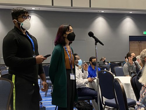 sarisha and aadil ask questions at water institute symposium