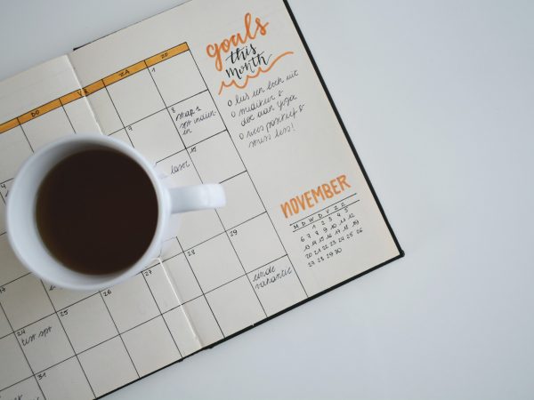 coffee on top of planning journal