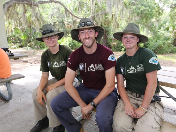 three florida conservation corps members