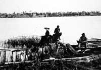 Jessie Dakin pole fishing along the railroad tracks Georgetown