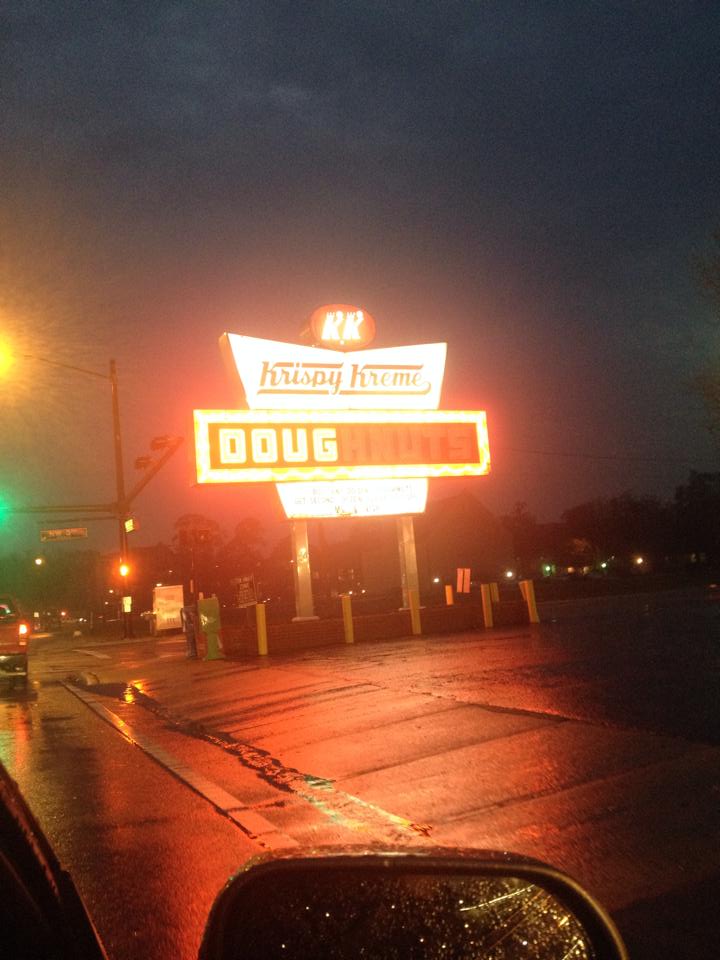 krispy kreme sign with doug letters illuminated